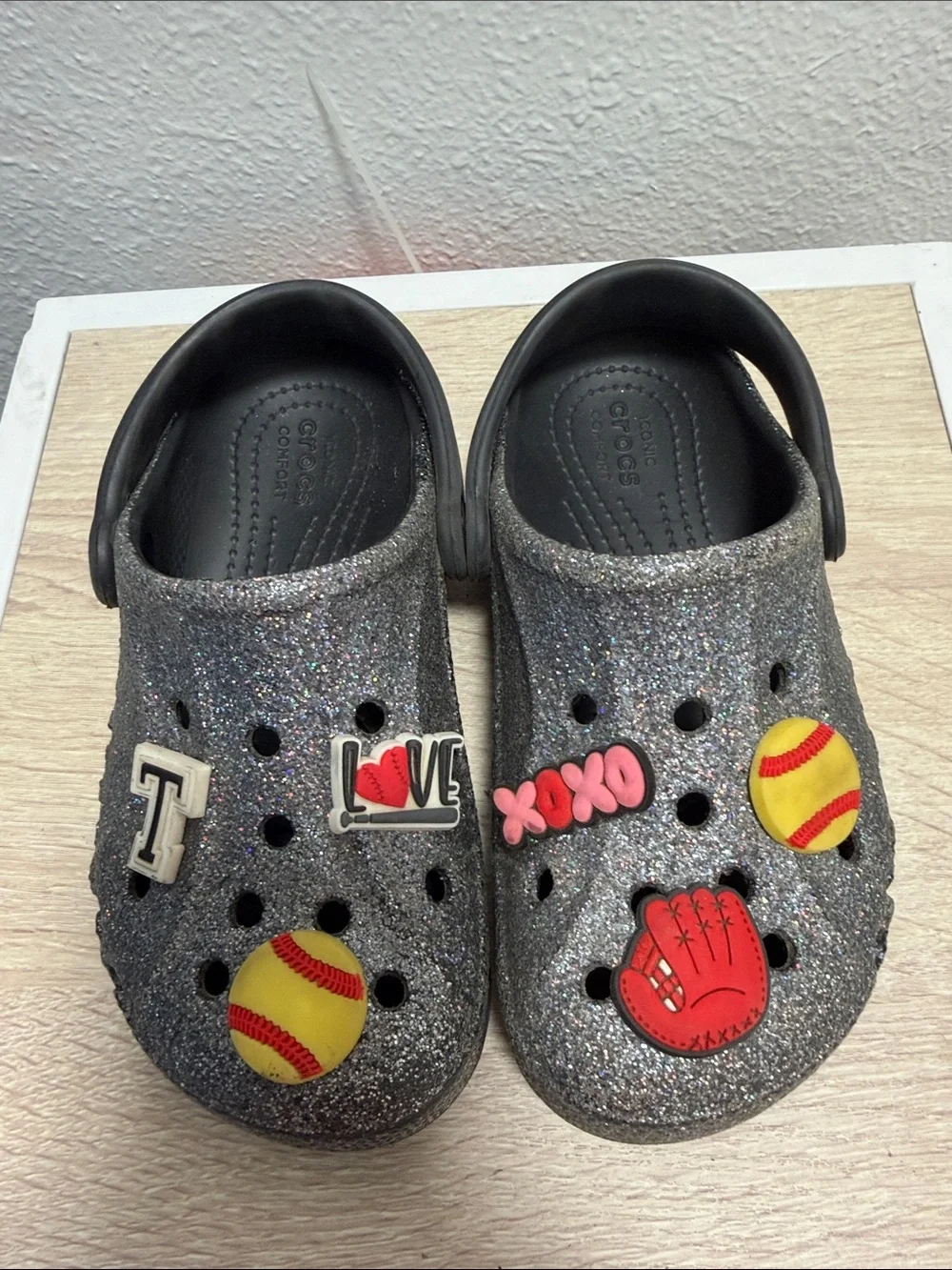 CROCS Kids' Silver Glitter Clog with Red & Yellow Sports Charms